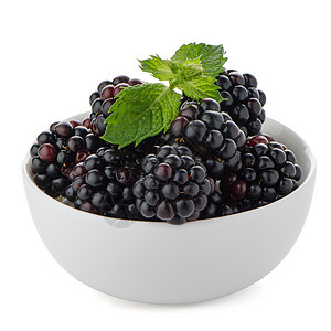 白碗黑莓黑色绿色紫色叶子甜食浆果图片