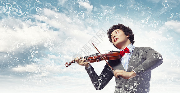 男青年小提琴家气氛音乐家艺术成人古典音乐动作音乐会剧院工作商业图片