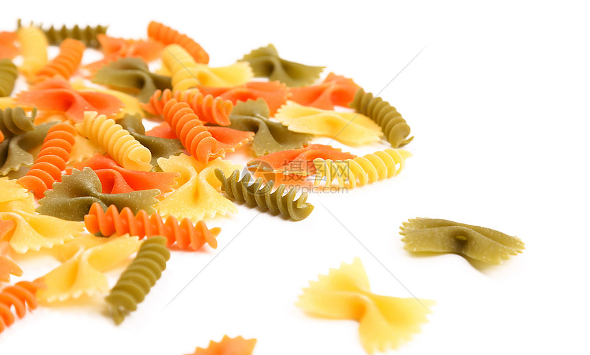 三种颜色的不同面条橙子绿色饺子食物螺旋营养品派对黄色三色图片