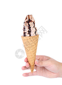 手握着冰淇淋和巧克力托普图片