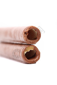 华夫饼卷涂着巧克力奶油美食团体芳香食物螺旋管子蛋糕可可饼干图片