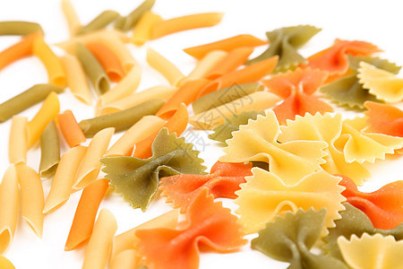 三种颜色的不同面条食物派对饺子螺旋黄色橙子营养品三色绿色图片