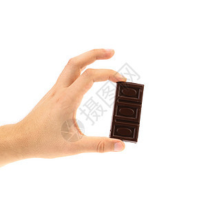 手握着暗巧克力棒产品巧克力片段活力照片牛奶瓷砖正方形甜点营养图片