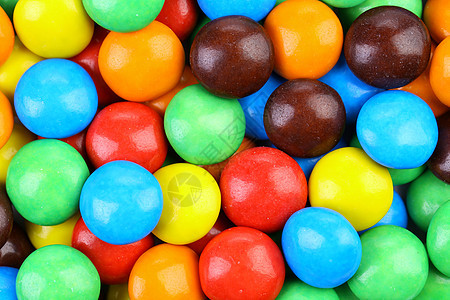 巧克力球在多彩的冰淇淋里回味甜点绿色橙子按钮水果滴黄色糖果多样性诱惑釉面图片