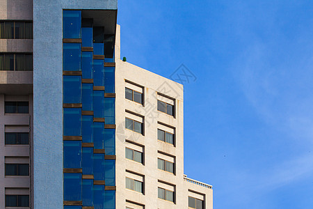 拥有现代建筑结构的豪华建房旅馆外厅住宿摩天大楼商业办公室住宅大厦蓝色房间办公楼酒店图片