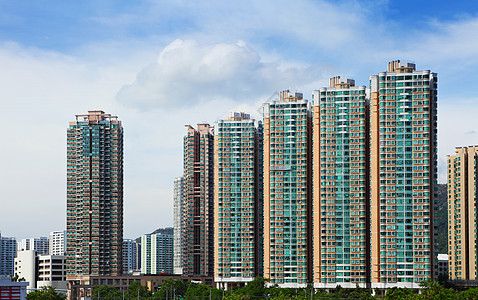 香港的住房建筑民众城市天空土地房子窗户家庭蓝色绿色图片
