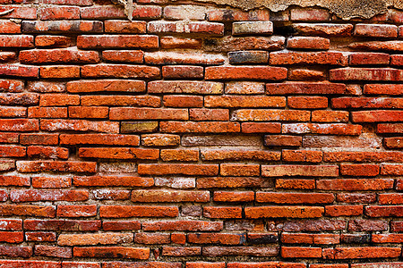 古砖墙的详情裂缝黄色建筑学建造水泥建筑废墟红色背景图片