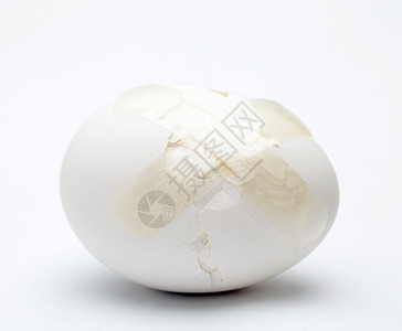 用塑料石膏粉碎白蛋伤口食物动物医疗保险脆弱性磁带白色母鸡早餐伤害图片