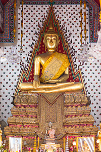 默念中的金芽珠雕像遗产宗教冥想历史性蓝色阳台佛教徒金子旅行门廊图片
