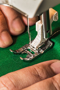 缝纫机缝纫器具工艺织物针脚材料宏观棉布裙子生产图片
