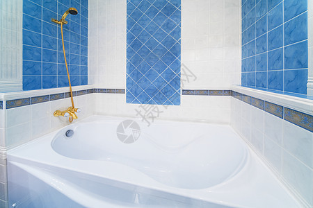 白浴浴缸管道龙头金属地面建筑学蓝色房间洗涤洗澡图片