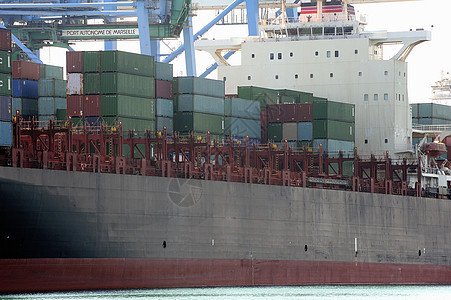 将集装箱运至Quy货运进口油船船厂商业起重机码头城市运输蓝色图片