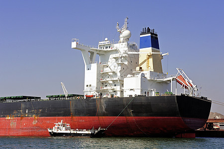 卸载矿石货物班轮人士船运商务衬垫出口运输港口码头海洋贮存图片