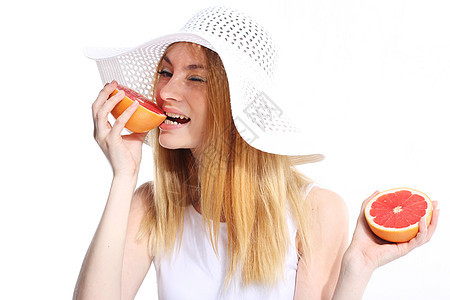 有新鲜葡萄汁的女孩微笑营养幸福饮食女性白色快乐展示柚子食物图片