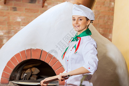 女青年厨师餐饮食物成人火炉工作帽子美食职员炊具加热器图片