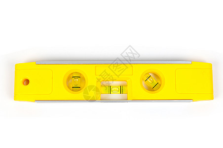白色背景上孤立的黄色精神水平 Y气泡玻璃工作宏观建造重力水平地乐器工具液体图片