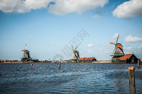 荷兰风车村荷兰风车能源瓷砖建筑天空蓝色木头翅膀背景