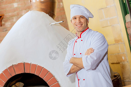 年轻男厨师食谱餐厅烹饪烤箱面包师面粉男人美食餐饮木板图片