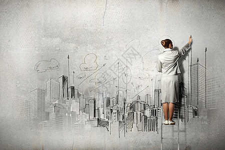 画墙的女商务人士建设者工作女性职业工程师打印城市商务力学套装图片