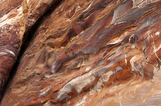 沙岩峡谷抽象模式形成 锡克峡谷 佩特拉编队分层粉色砂岩雕刻红色石头矿物悬崖沙漠图片