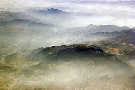 从阿尔卑斯山上空的飞机上查看白色土地眼睛天线旅行顶峰风景墙纸黑色环境图片