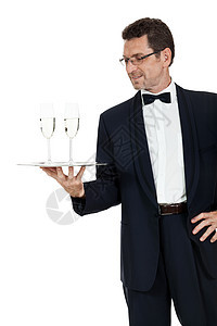 两杯香槟的男成年男服务员 隔离开来酒店职员服务餐饮工人庆典管家套装盘子玻璃图片