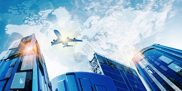 天空中的平地玻璃蓝色旅行建筑城市办公室地标公司客机运输图片