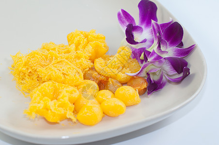 泰国糖果蜜饯黄色通约食物美食金滴面包图片