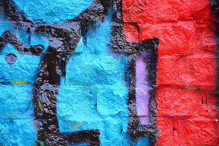 涂满多彩涂鸦的旧砖墙艺术城市创造力图片