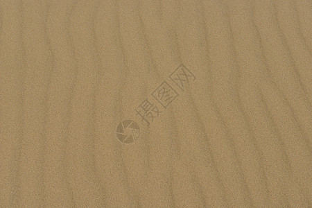 沙砂质线条海浪侵蚀海滩阴影棕色热带晴天沙漠图片