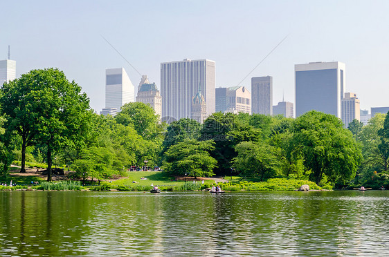 曼哈顿中央公园风景草地办公楼摩天大楼建筑学旅行城市晴天地标公园图片