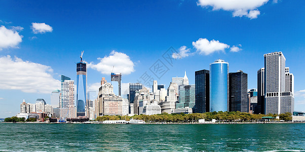 纽约市下城自由塔楼海港国家建筑天际城市天空反射市中心日落景观图片