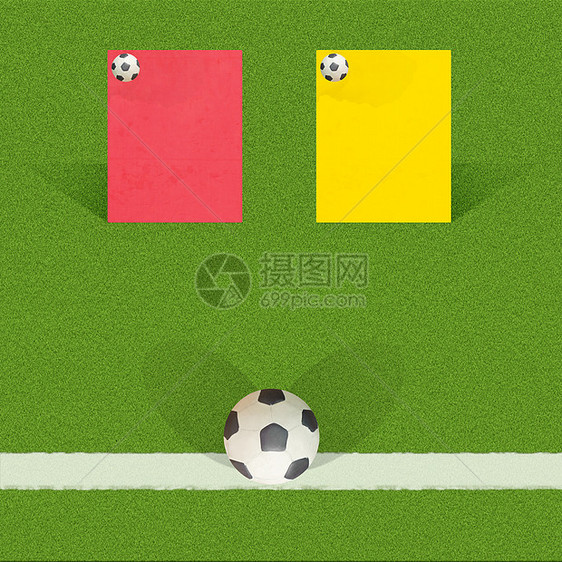 印有草背景裁判卡的可塑性足球图片