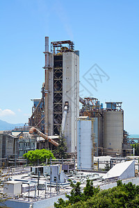工业工厂蓝天天空炼油厂生产植物汽油建筑学化学品化工厂烟囱图片