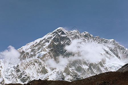 雪雪山蓝色天空高山爬坡旅行活动山峰冰川顶峰环境图片