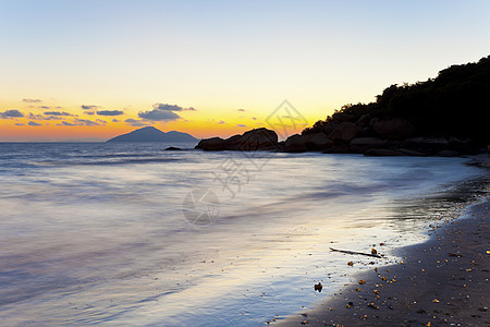 沙滩上日落 天空美丽海滩橙子天际海岸线戏剧性阳光海浪海岸太阳镜子图片