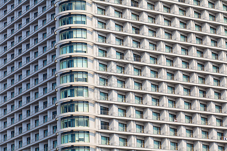酒店外观建筑学镜子天空财产阳光玻璃办公室场景商业总部图片