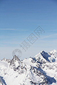冬季山区假期天空阳光高山荒野爬坡环境季节滑雪顶峰图片