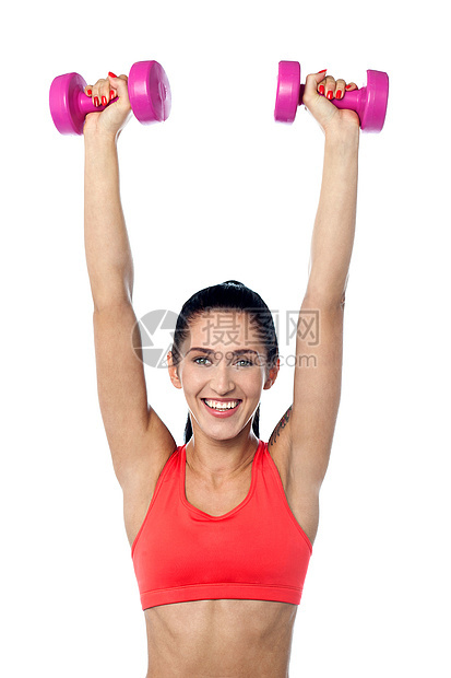 快乐的健身女举起哑铃饮食精力女性训练讲师健身房培训师运动装活力身体图片