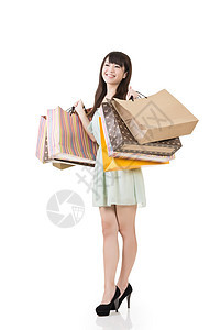 持有购物袋的有吸引力的亚洲妇女购物中心消费者购物者魅力购物销售零售工作室高跟鞋顾客图片