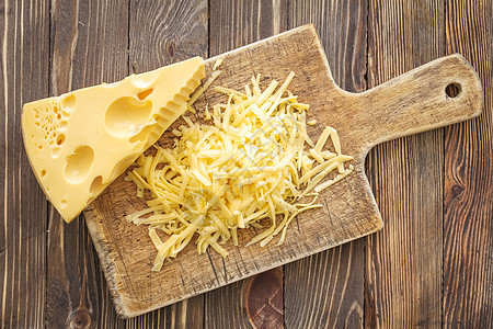 奶酪食谱三角形烹饪产品熟食食物橙子奶制品桌子木板图片
