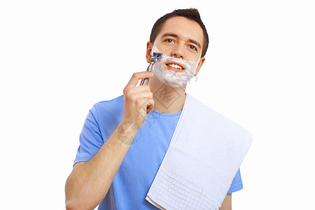 家里的年轻人刮胡子专注肩膀成人摄影护理浴室泡沫剃须卫生男人图片