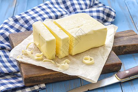 黄油食物桌子奶制品面包蓝色切割饮食脂肪卷曲营养图片