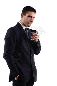 男人拿着红酒的红酒杯白色玻璃成人管理人员酒精工作室套装红色饮料男性图片