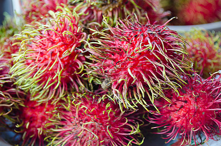 新鲜的拉姆布丹泰国水果食品始作俑者营养食物牙齿料理吸引力美味红色图片