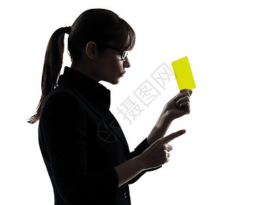 女商务人士显示黄色的卡片轮光黄牌警告裁判女性成年人商务阴影权威女士失败图片