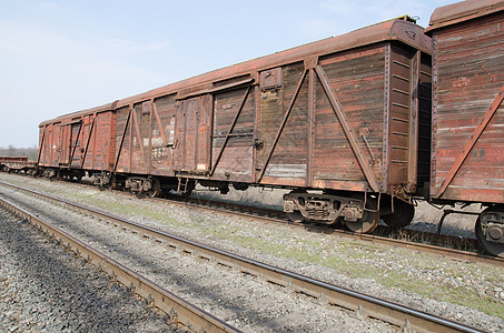 旧老生锈的火车车厢物流结构基础设施运输过境天空车皮路线栏杆货物图片
