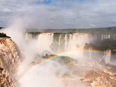 在伊瓜苏瀑布的瀑布热带旅行彩虹风暴公园丛林全景洪水流动森林图片