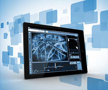 数字生成背景上数字平板电脑中的细胞图片