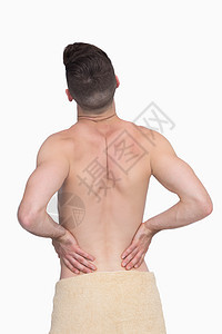背部疼痛的无上衣男子的近视按摩躯干毛巾卫生肌肉身体背痛男人男性保健图片